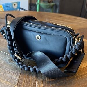 lululemon athletica Black Crossbody Bag with Gold Accents